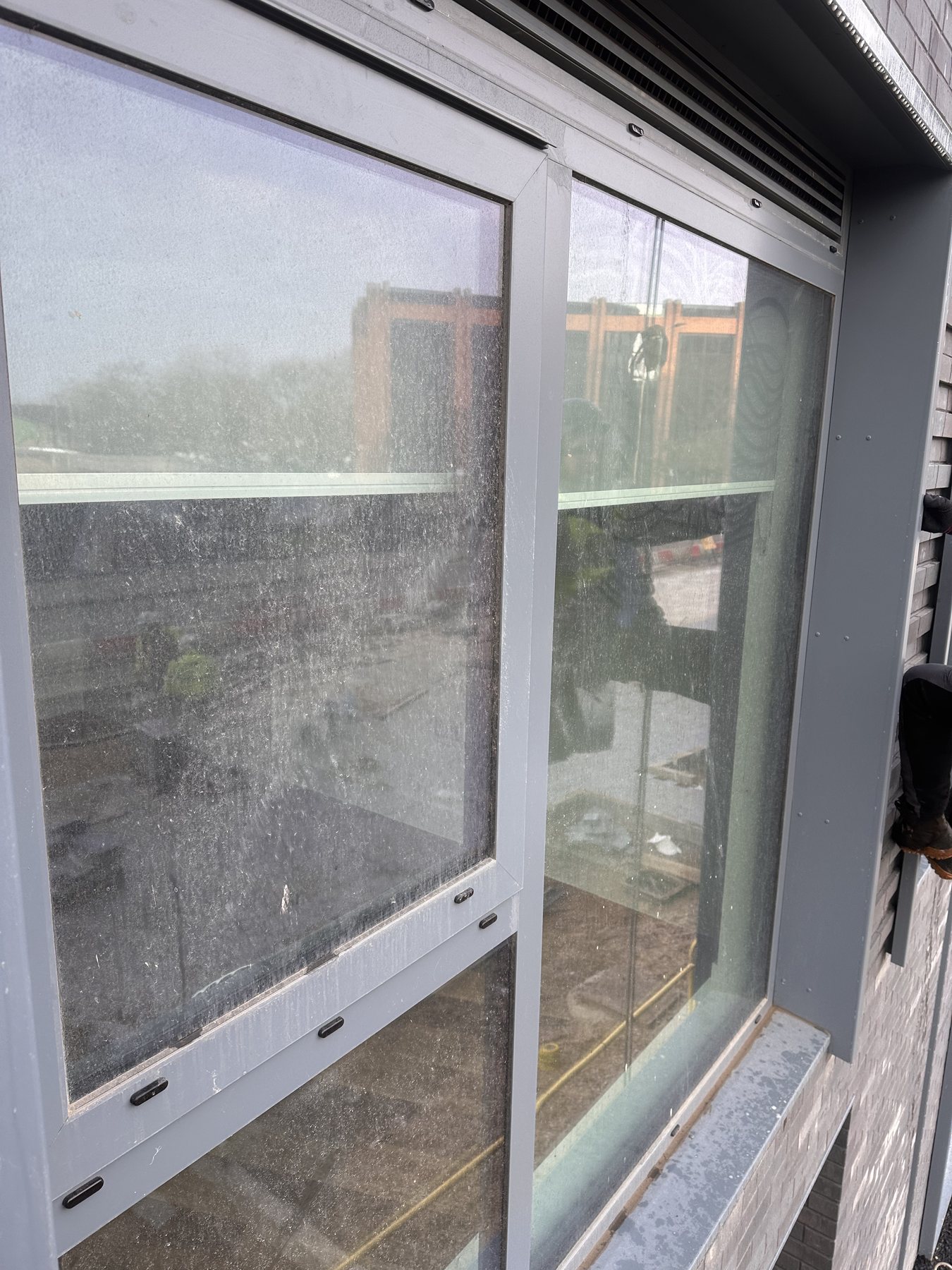 Commercial façade cleaning on a high-rise building in Peterborough