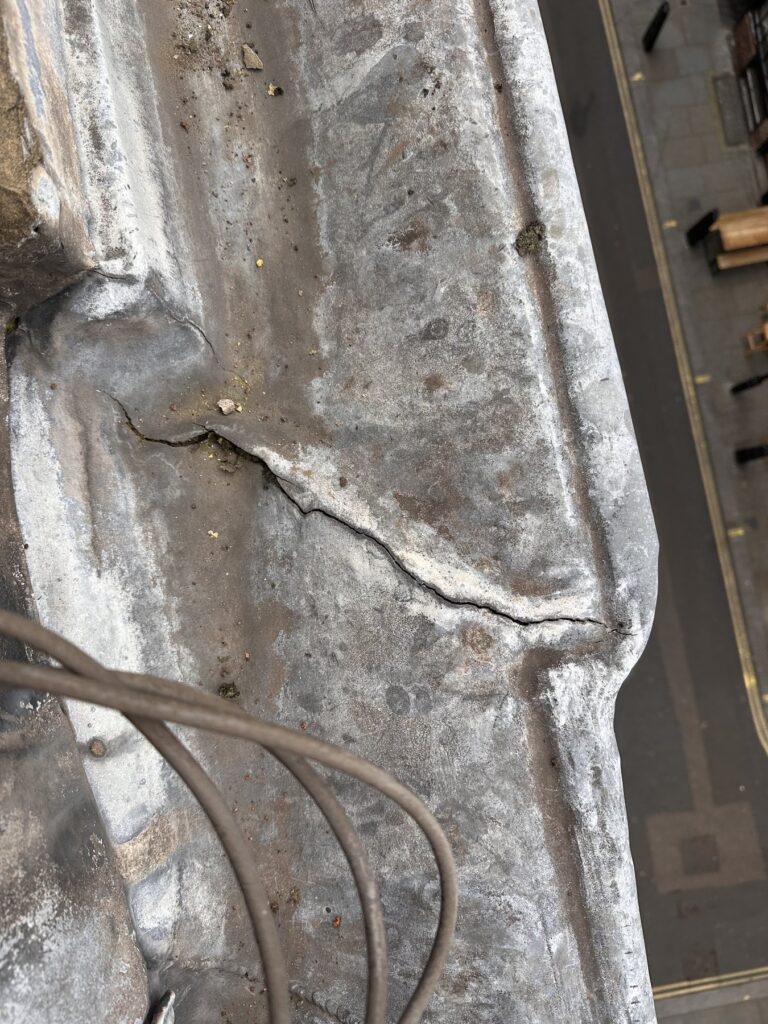 Rope access roof leak inspection on a commercial building in London